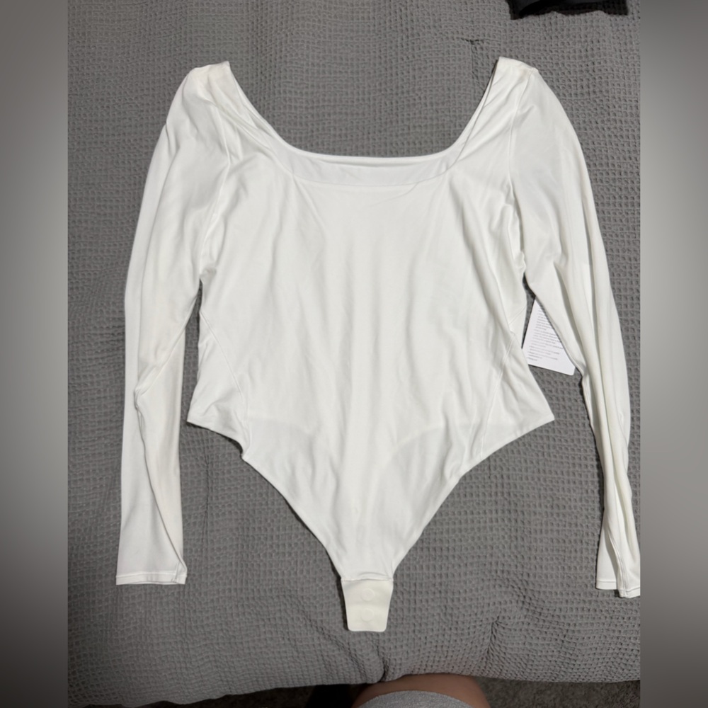 Lululemon Athletica White Long Sleeve Bodysuit